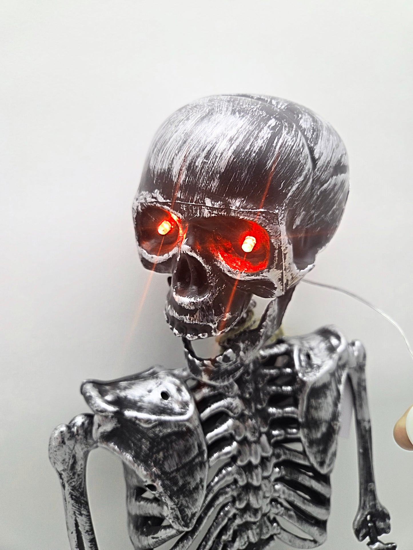 Light-Up Eyes & Sound Silver Plastic Skeleton 36 inch (3 x AAA Batteries are not Included)