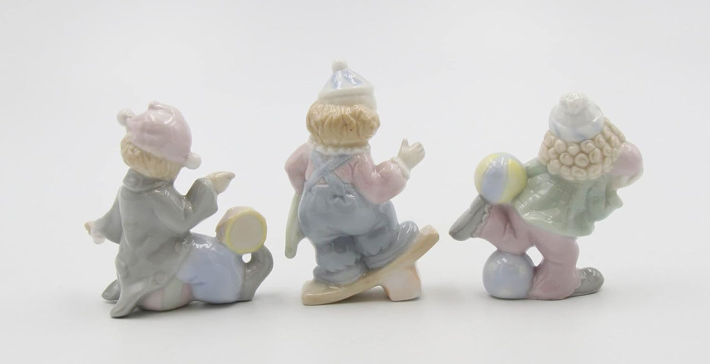 Cosmos Gifts Fine Porcelain Children Performing Clown Acts Set of 3 Figurines 3" H