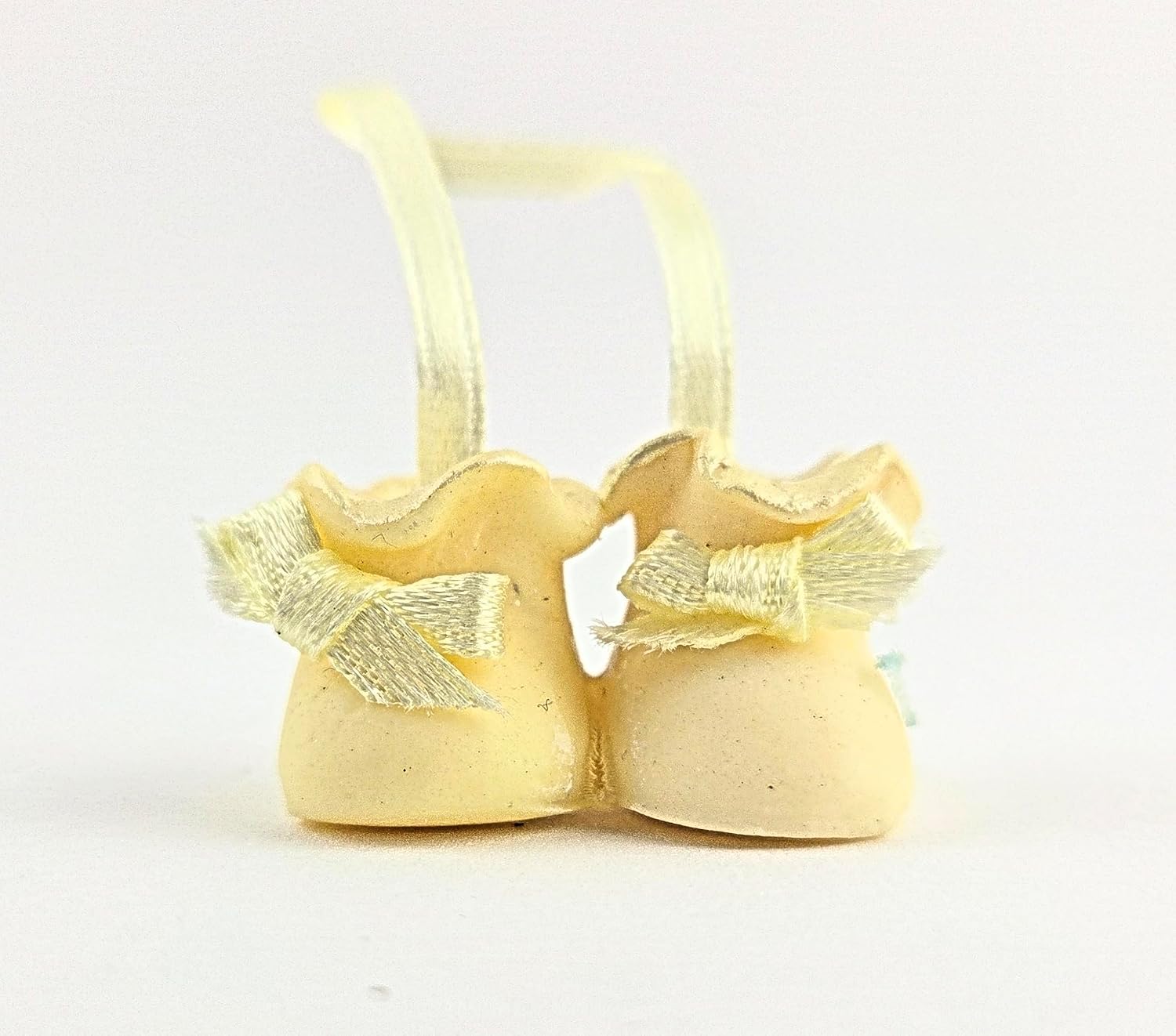Party Favors Plus Cold Porcelain Bootie Capias Figurines Yellow 12 Count