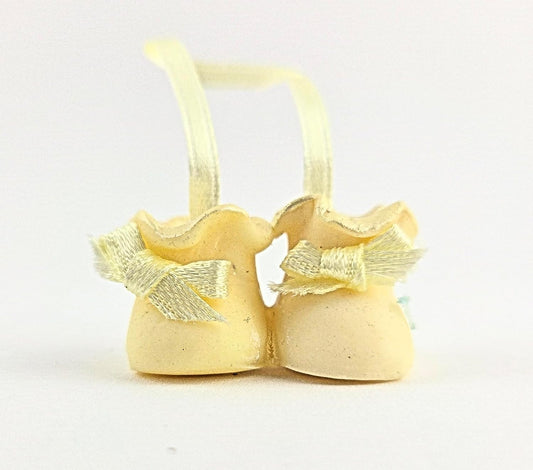 Party Favors Plus Cold Porcelain Bootie Capias Figurines Yellow 12 Count