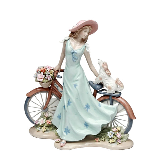Cosmos Gifts Fine Porcelain Lady Riding Bike with Dog Figurine 10-5/8" H